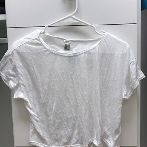 White tee with cuts in the back